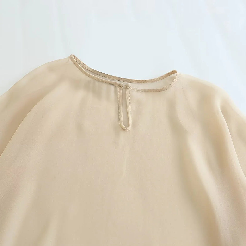 Blusa Capa Assimétrica