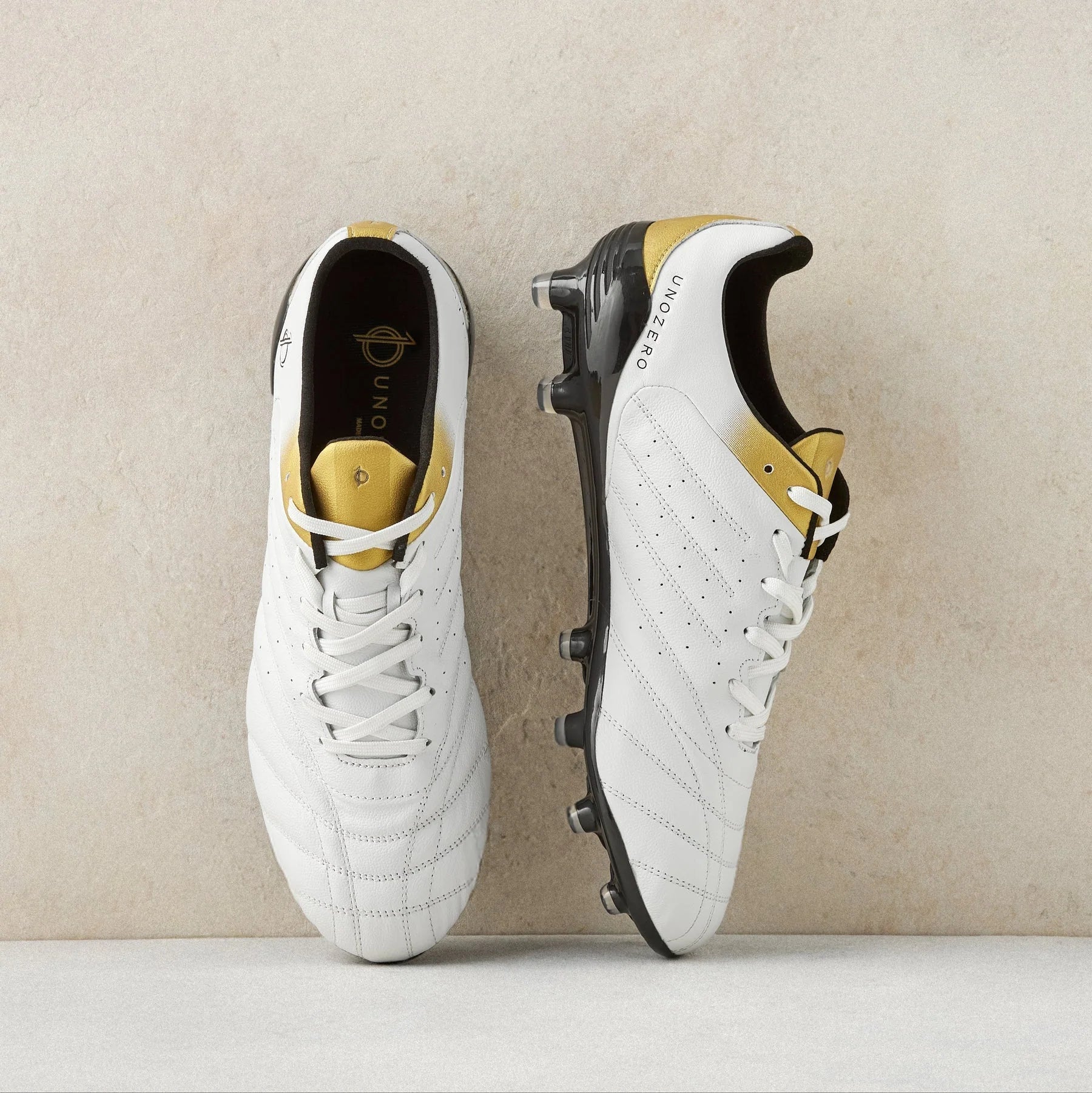 Unozero Aventto FG Firm Ground Soccer Cleats White